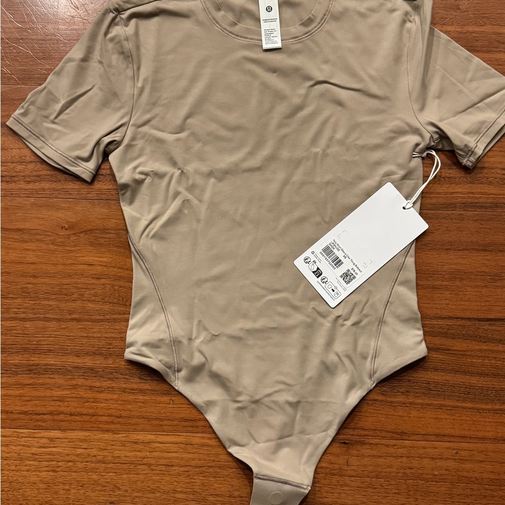 NWT lululemon athletica Tan Bodysuit
